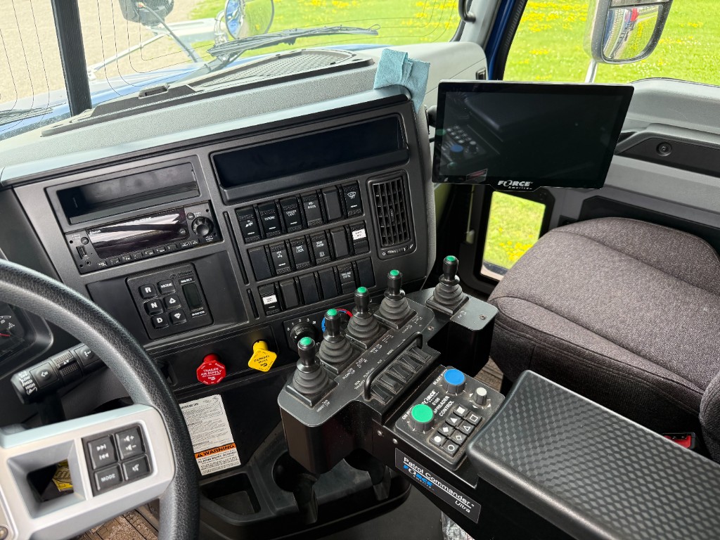 Cab controls: Force America Patrol Commander joysticks and screen for running the plow, wing, and sander.